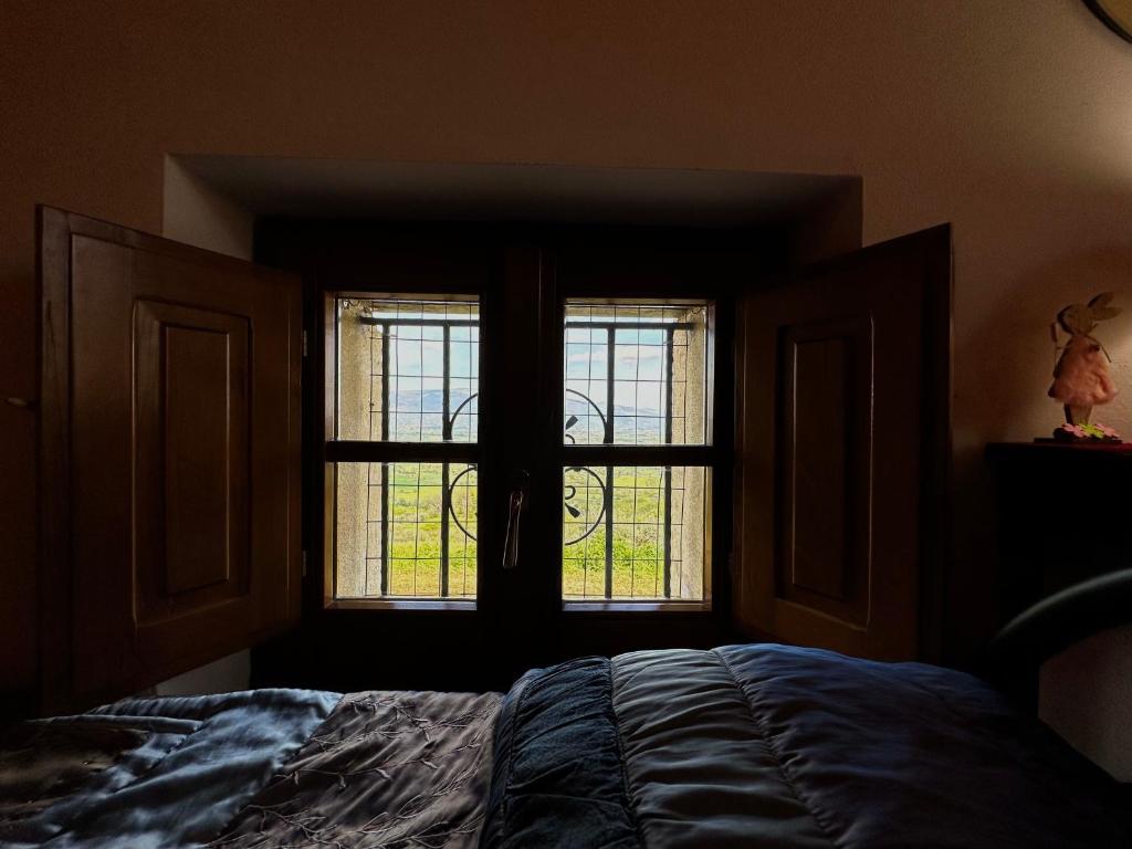 Postel nebo postele na pokoji v ubytování B&B Madonna Del Latte