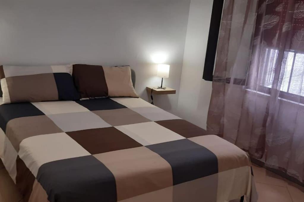 Postel nebo postele na pokoji v ubytování Casa Poseidonia - intero alloggio in riva al mare
