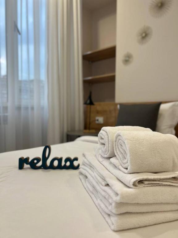 Postel nebo postele na pokoji v ubytování Sweet Home Apart-Hotel