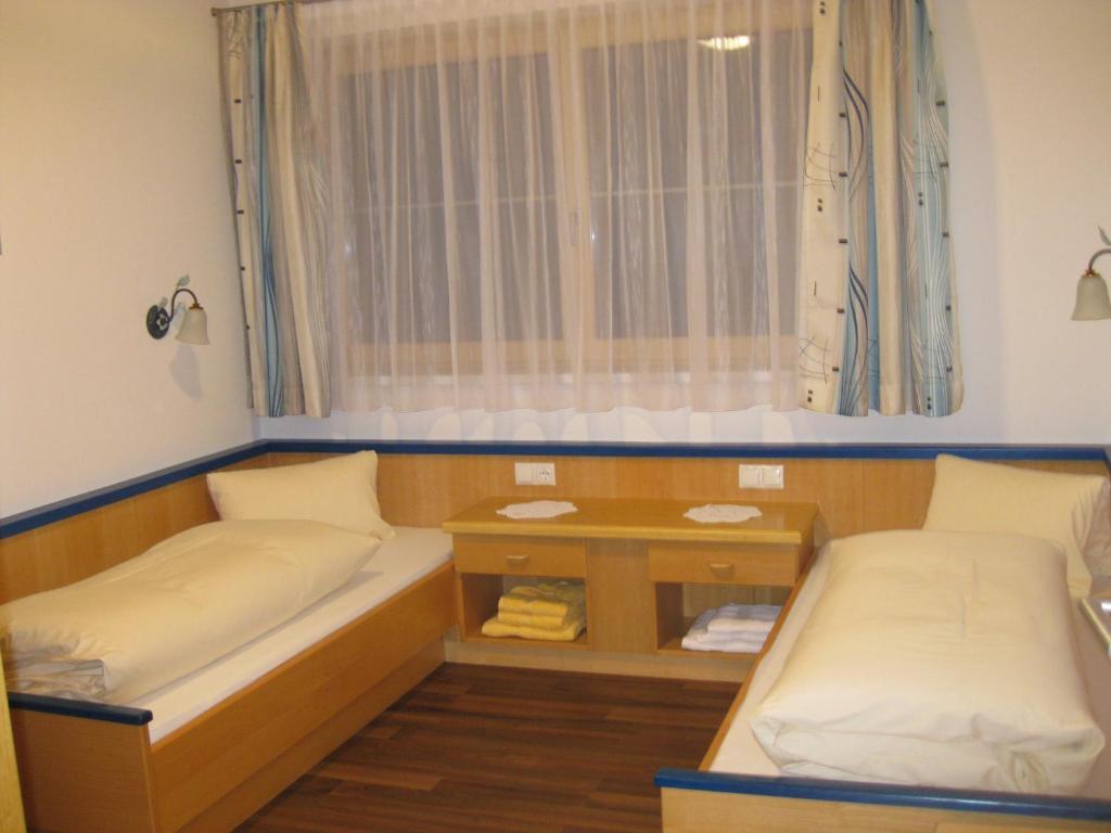 Postel nebo postele na pokoji v ubytování Apartment Gitti
