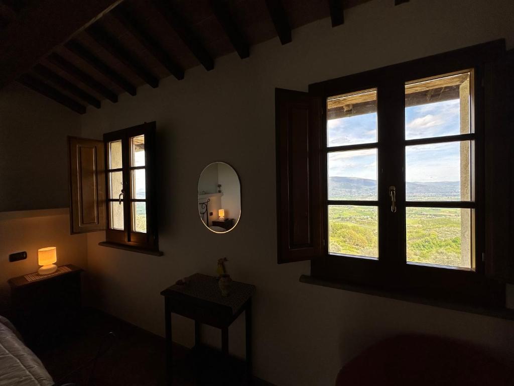 Postel nebo postele na pokoji v ubytování B&B Madonna Del Latte