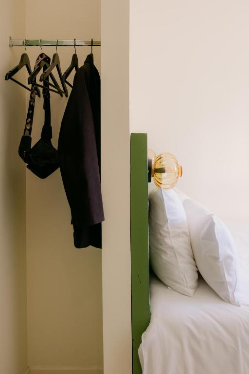 Postel nebo postele na pokoji v ubytování Le Lieu Dit