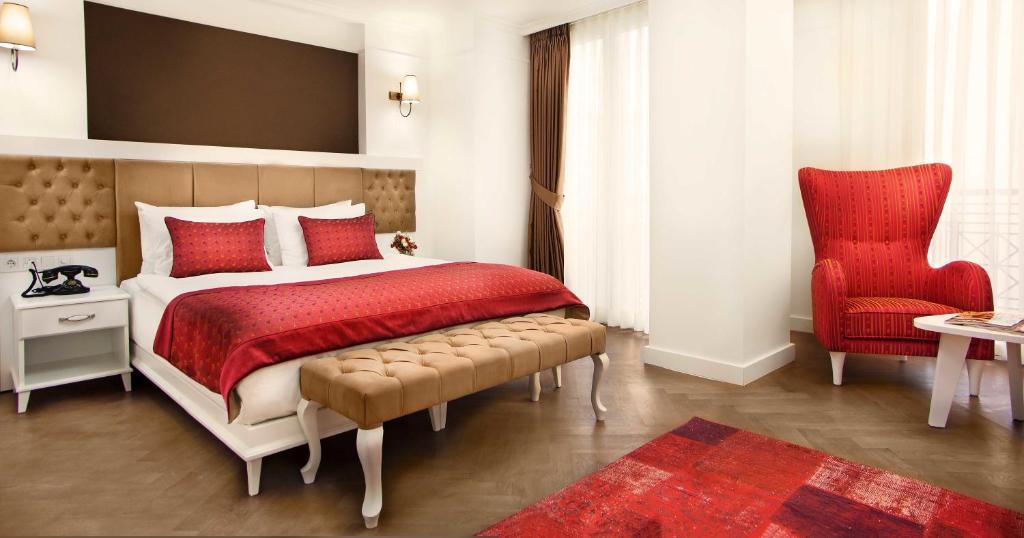 Postel nebo postele na pokoji v ubytování Astan Hotel Galata