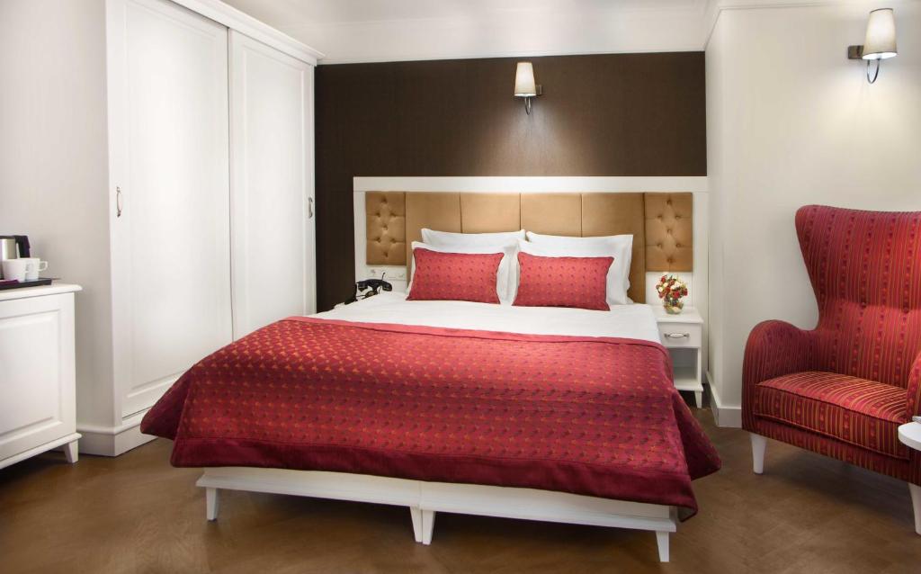 Postel nebo postele na pokoji v ubytování Astan Hotel Galata