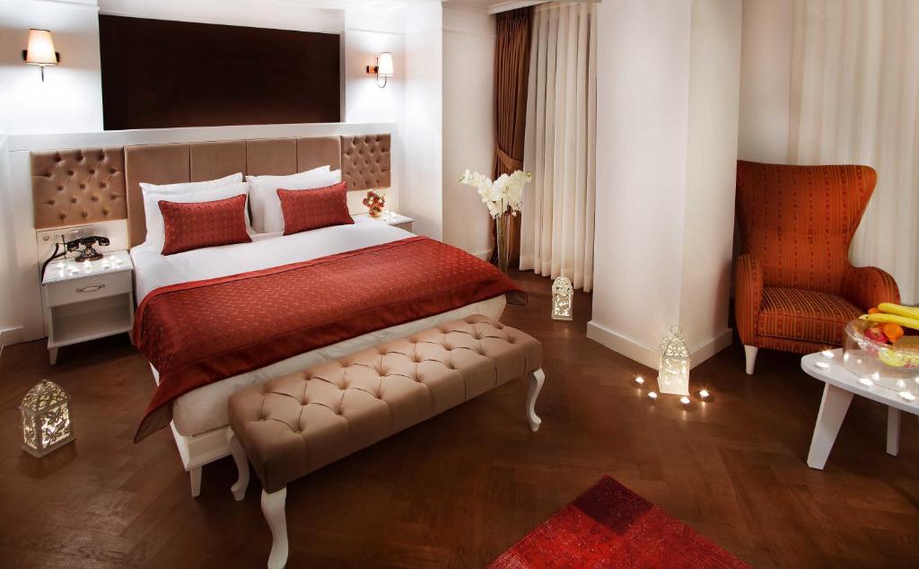 Postel nebo postele na pokoji v ubytování Astan Hotel Galata