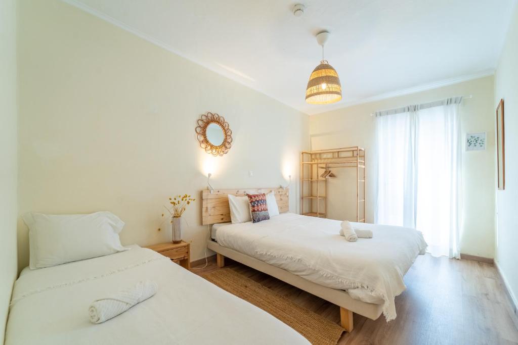 Postel nebo postele na pokoji v ubytování Aljezur Villas