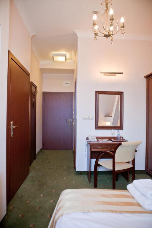 Posteľ alebo postele v izbe v ubytovaní Hotel Masovia