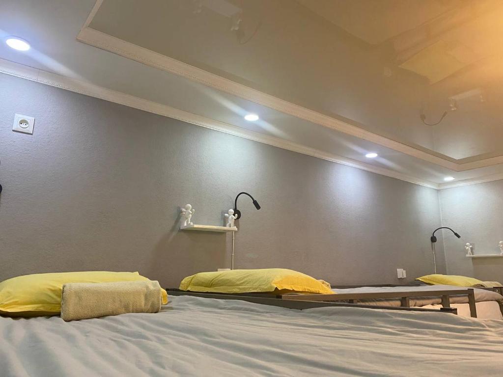 Postel nebo postele na pokoji v ubytování Downtown Homestay