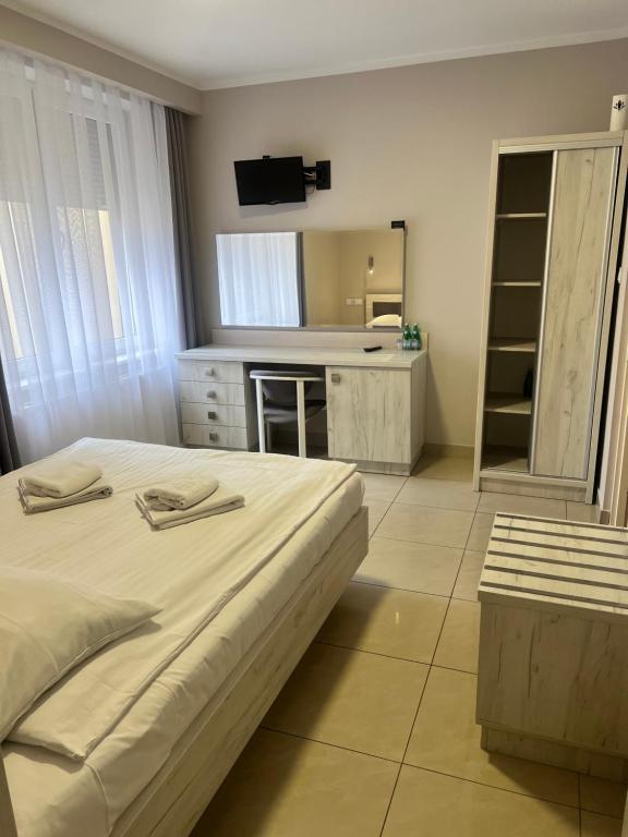 Posteľ alebo postele v izbe v ubytovaní Rodos