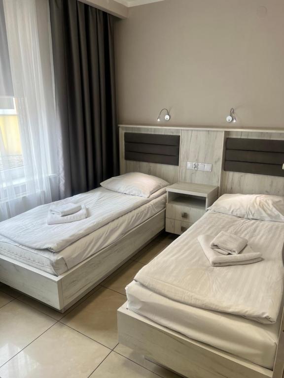 Posteľ alebo postele v izbe v ubytovaní Rodos