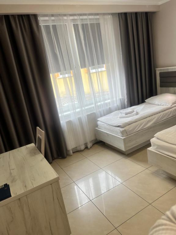Posteľ alebo postele v izbe v ubytovaní Rodos