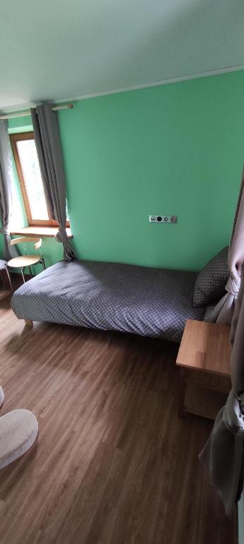 Postel nebo postele na pokoji v ubytování Les gîtes d'Argentin