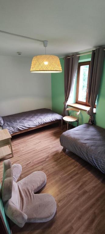 Postel nebo postele na pokoji v ubytování Les gîtes d'Argentin