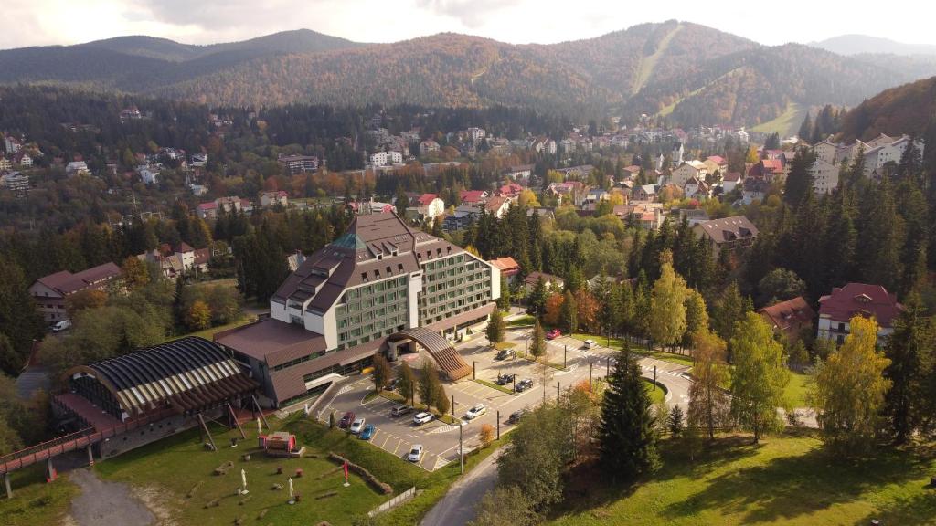 an aerial view of a building in the mountains at Hotel Orizont in Predeal