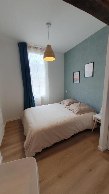 Postel nebo postele na pokoji v ubytování Le Central