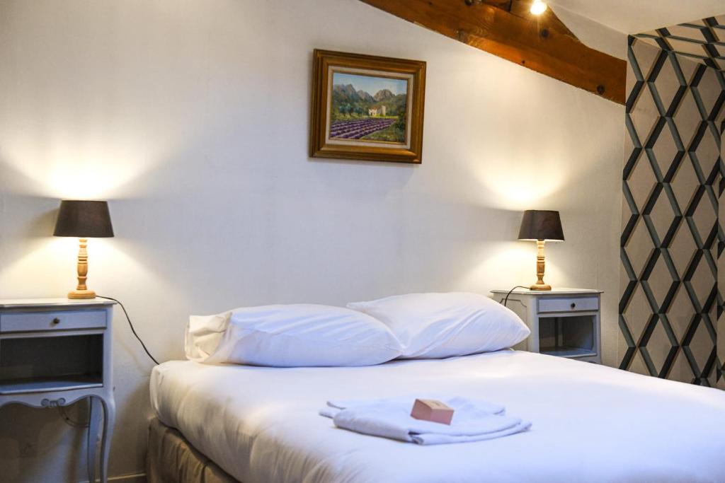 Posteľ alebo postele v izbe v ubytovaní Le Cabanon - Maison 2 ch avec jardin et parking