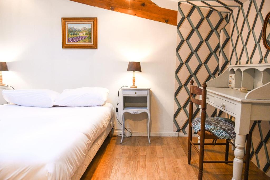 Posteľ alebo postele v izbe v ubytovaní Le Cabanon - Maison 2 ch avec jardin et parking