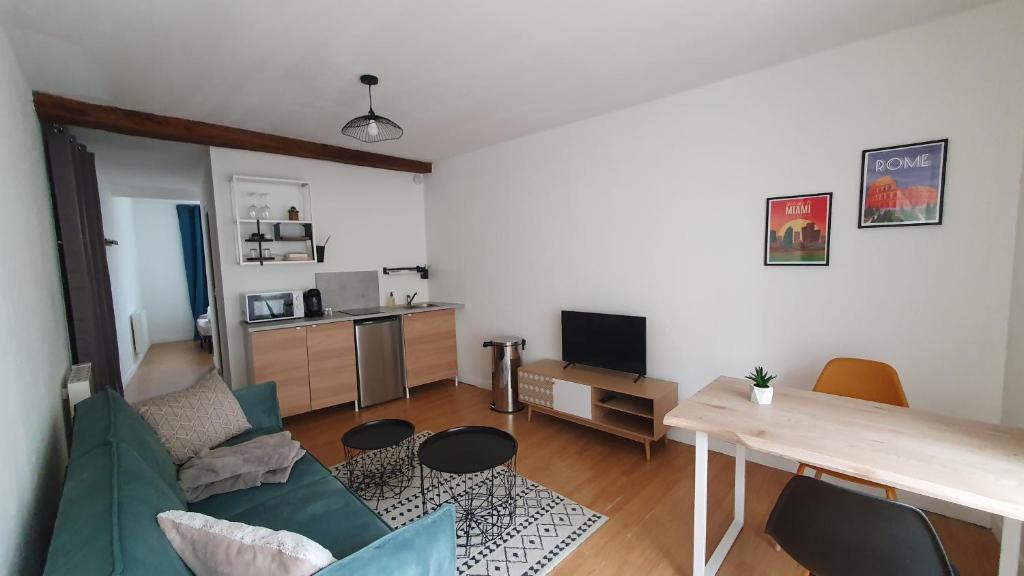 Kuchyň nebo kuchyňský kout v ubytování Le Central