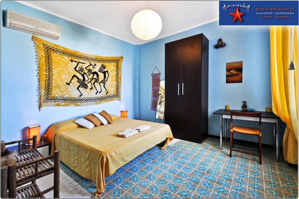 Postel nebo postele na pokoji v ubytování B&B Asteroidea