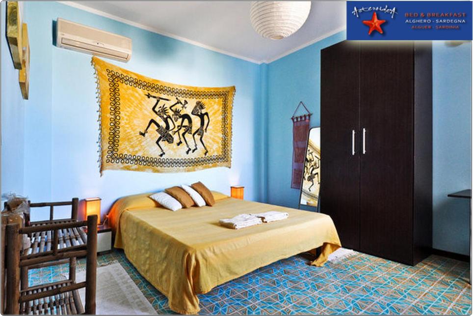Postel nebo postele na pokoji v ubytování B&B Asteroidea