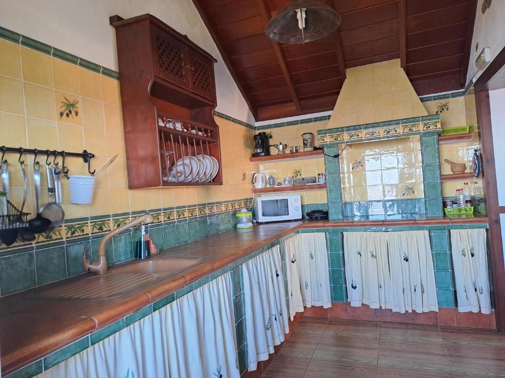 Kuchnia lub aneks kuchenny w obiekcie Casa El Faro