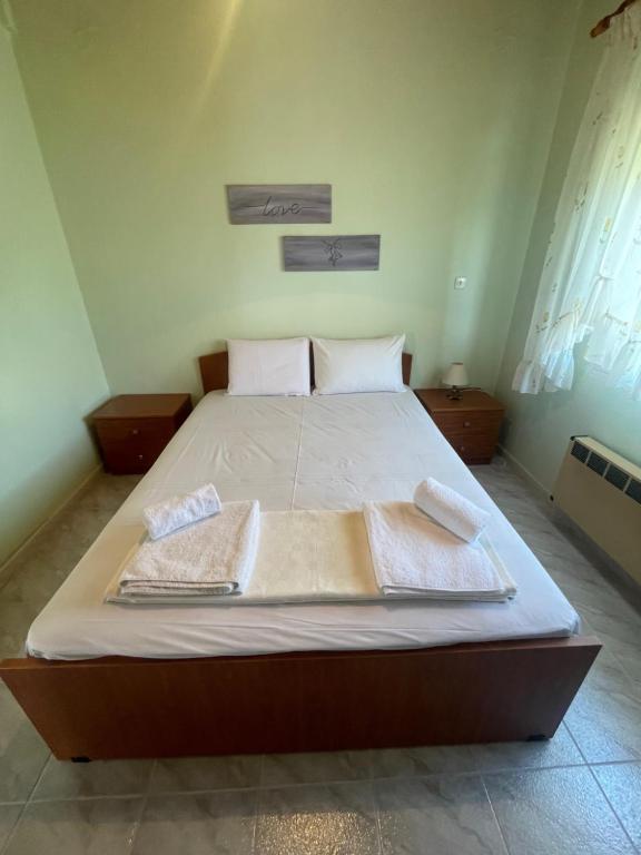 Postel nebo postele na pokoji v ubytování Hοme4U