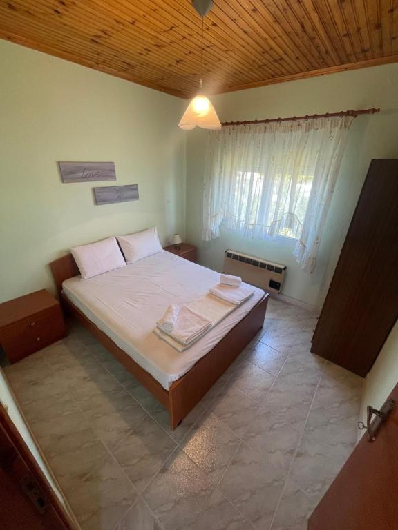 Postel nebo postele na pokoji v ubytování Hοme4U