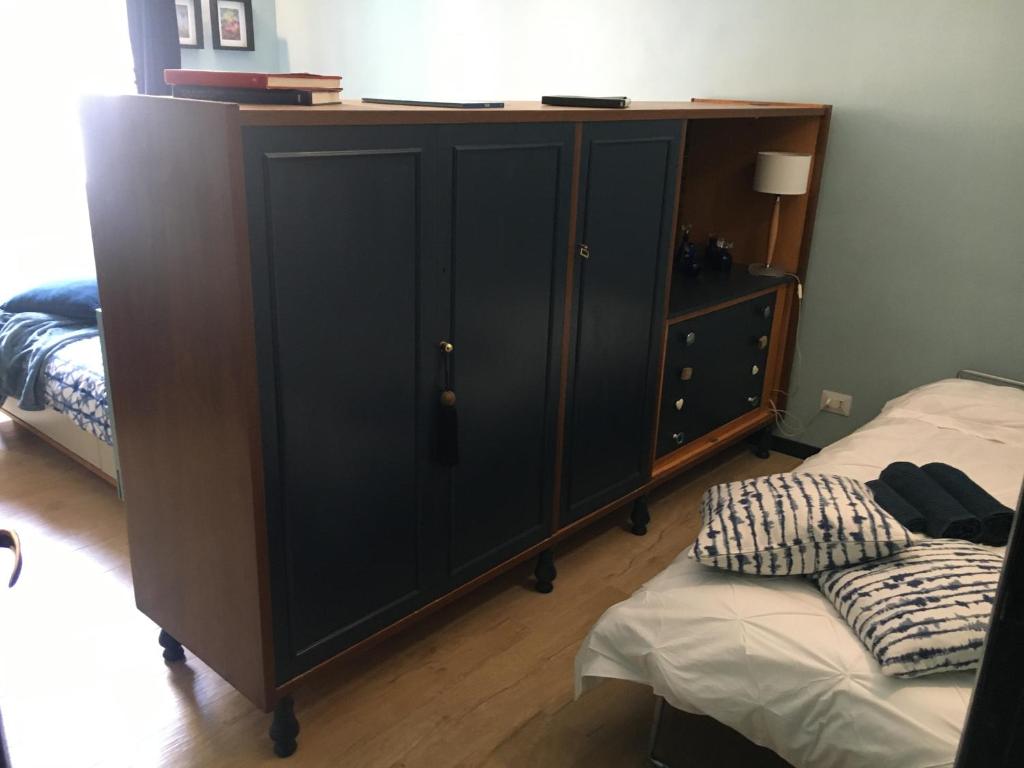 Posteľ alebo postele v izbe v ubytovaní Rasella44, Blu Apartment