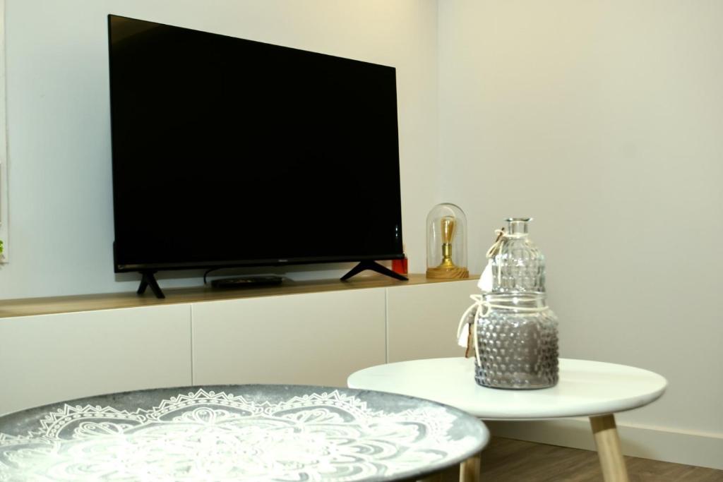 TV a/nebo společenská místnost v ubytování A&C Casa playa Torre del mar-Málaga