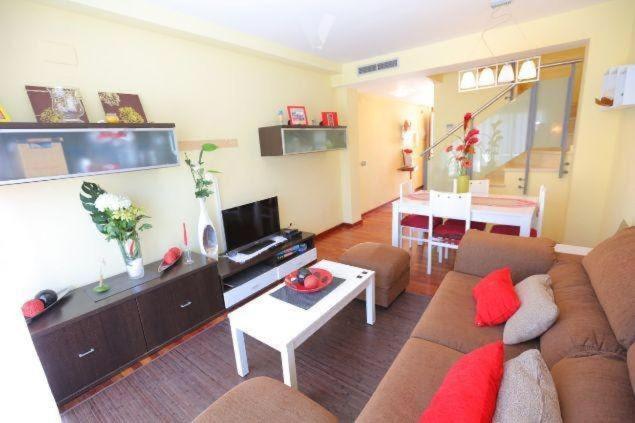 TV a/nebo společenská místnost v ubytování Vacaciones Cambrils sol Park
