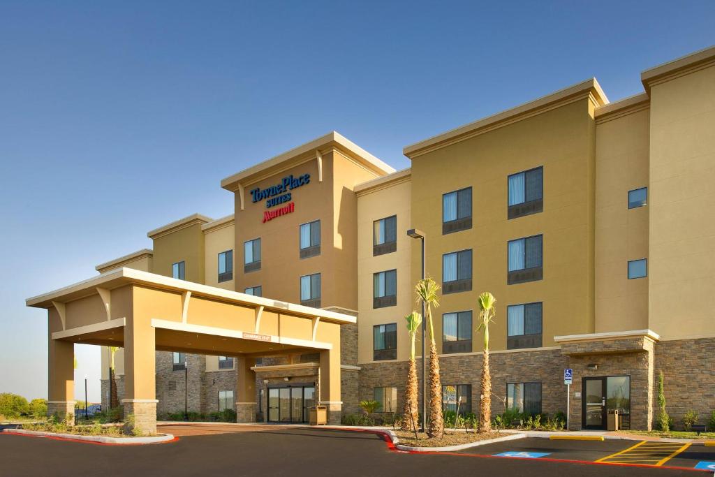 a rendering of the front of a hotel at TownePlace Suites by Marriott Eagle Pass in Eagle Pass