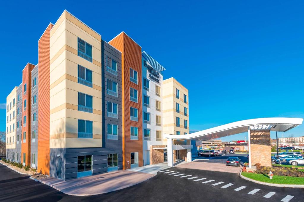a rendering of a building with a parking lot at Fairfield Inn & Suites by Marriott Boston Marlborough/Apex Center in Marlborough