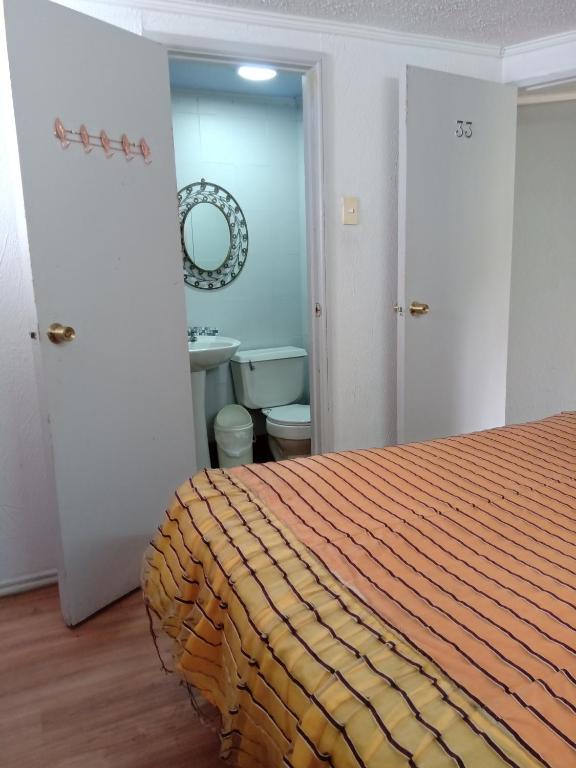 Koupelna v ubytování Hotel Capric