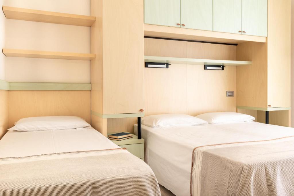 Postel nebo postele na pokoji v ubytování Hotel Ettoral