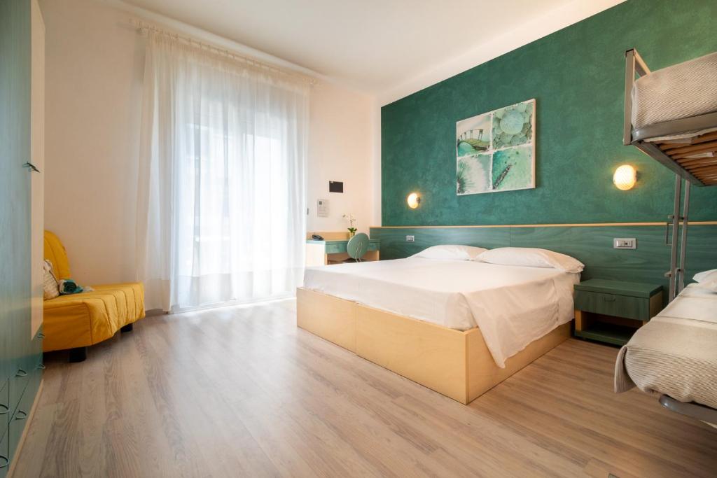 Postel nebo postele na pokoji v ubytování Hotel Ettoral