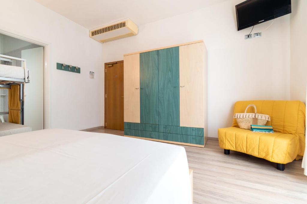 Postel nebo postele na pokoji v ubytování Hotel Ettoral