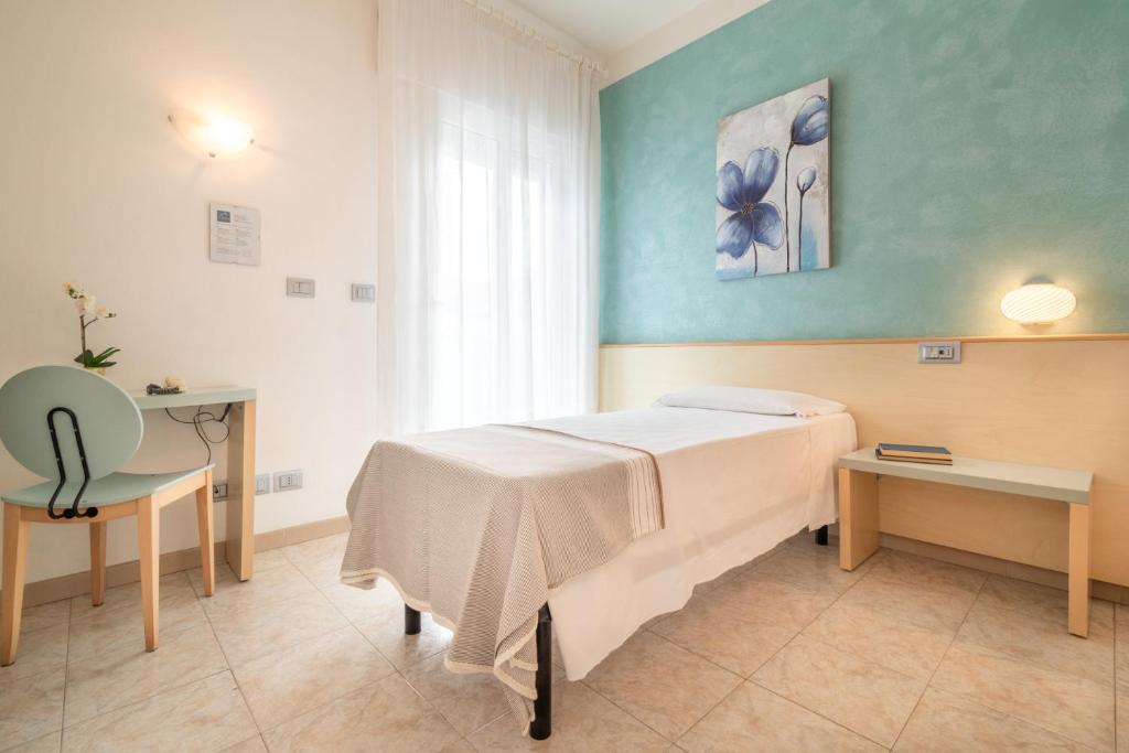 Postel nebo postele na pokoji v ubytování Hotel Ettoral