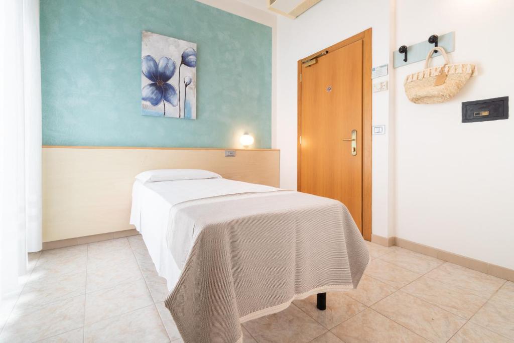 Postel nebo postele na pokoji v ubytování Hotel Ettoral