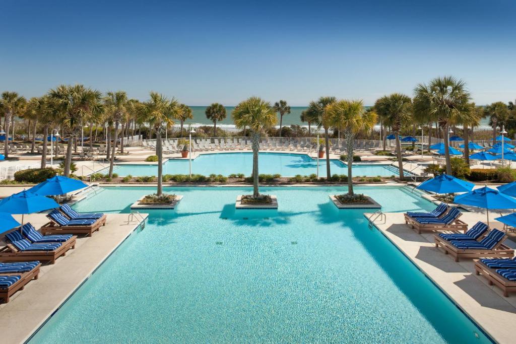 an image of a swimming pool at a resort at Marriott Myrtle Beach Resort & Spa at Grande Dunes in Myrtle Beach