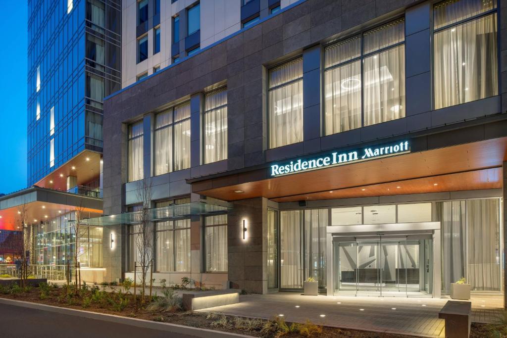 a building with a sign that reads residence inn aktion at Residence Inn by Marriott Seattle Downtown Convention Center in Seattle