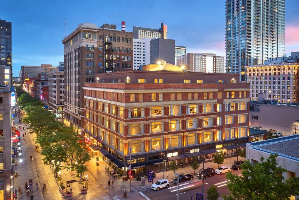 a building in the middle of a city with buildings at Courtyard by Marriott Denver Downtown in Denver