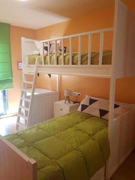 Posteľ alebo postele v izbe v ubytovaní Casa Fandiño