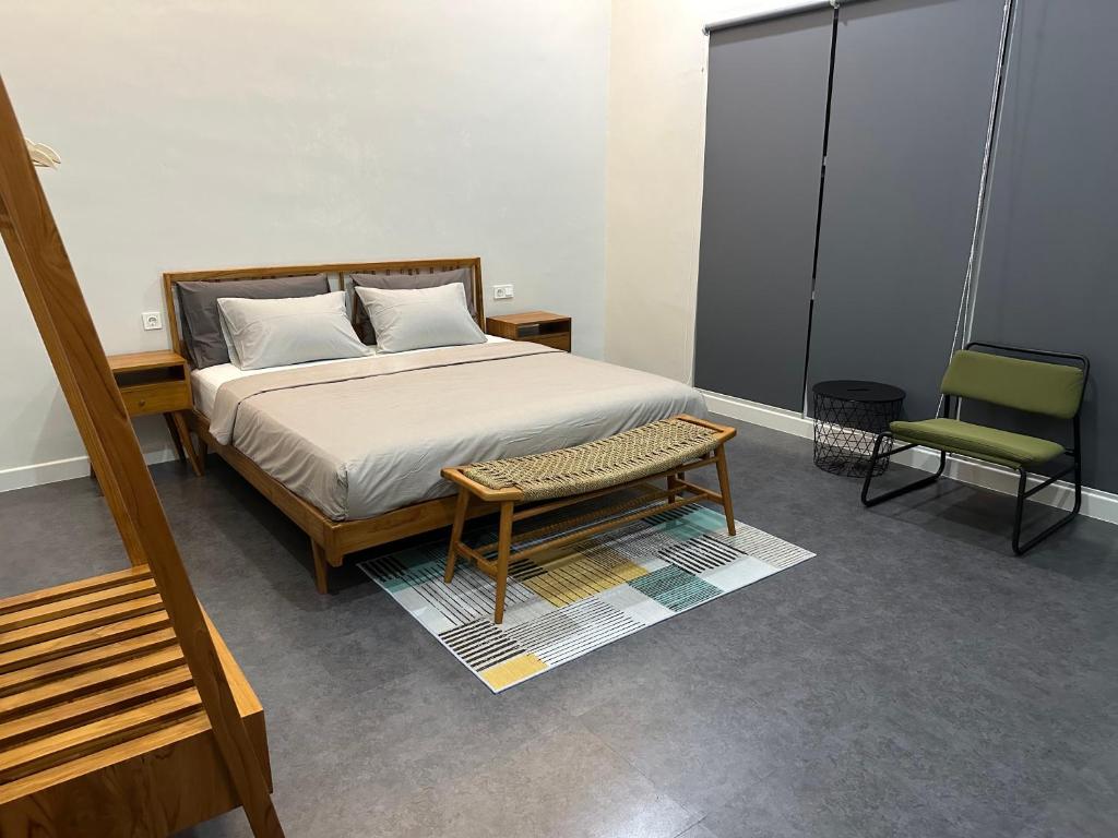 Postel nebo postele na pokoji v ubytování Cendhani Raras Gallery