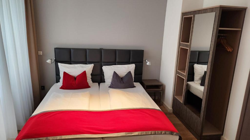 Postel nebo postele na pokoji v ubytování Gideon Hotel