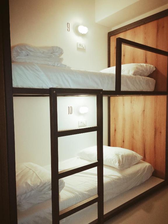 Postel nebo postele na pokoji v ubytování GARAGE HOSTEL