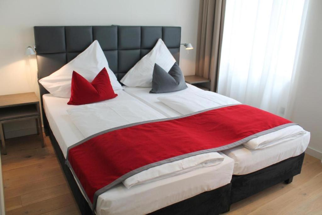 Postel nebo postele na pokoji v ubytování Gideon Hotel