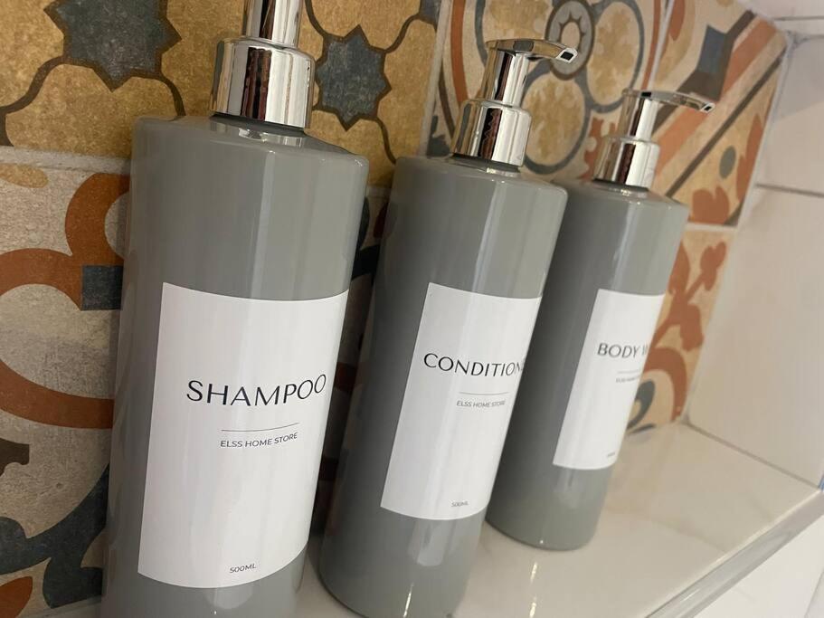 a group of three bottles sitting on a counter at The Railway Cottage Bridgnorth in Bridgnorth