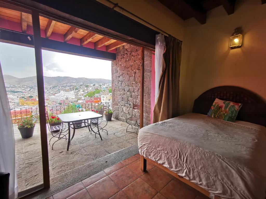 Postel nebo postele na pokoji v ubytování Hotel Chocolate Suites