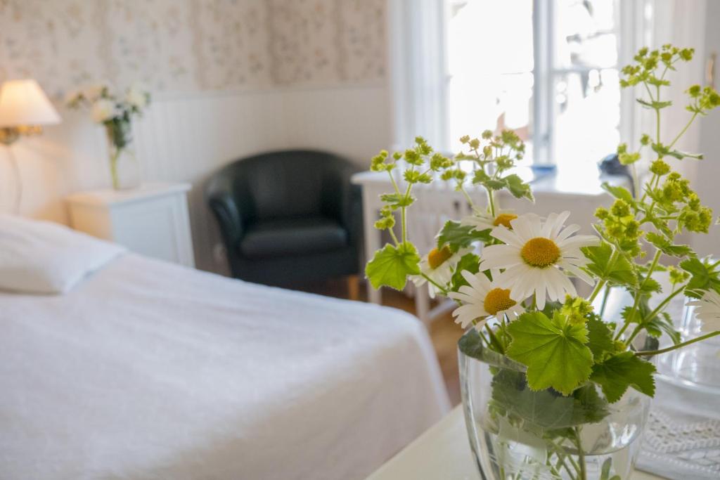 Postel nebo postele na pokoji v ubytování Järvsöbaden