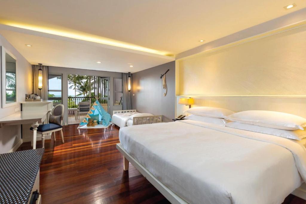 Postel nebo postele na pokoji v ubytování Sheraton Samui Resort